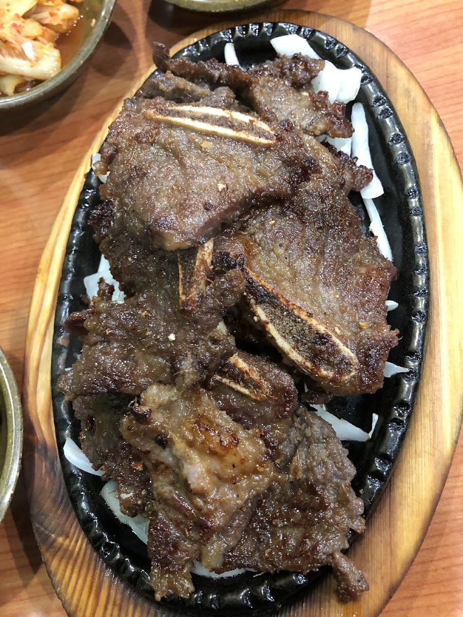 Meat and Seafood Dishes Served with Steamed Rice