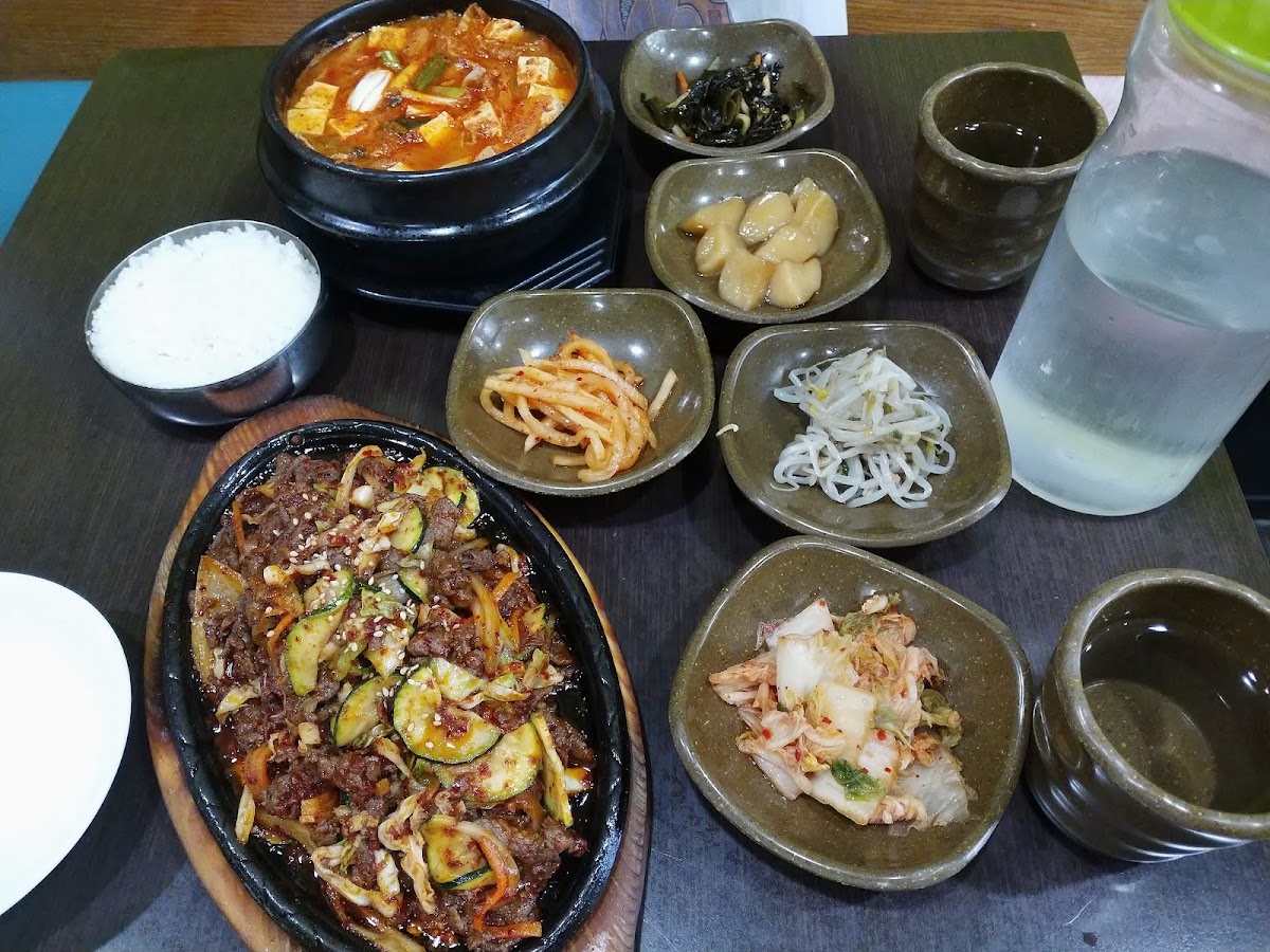 Meat and Seafood Dishes Served with Steamed Rice