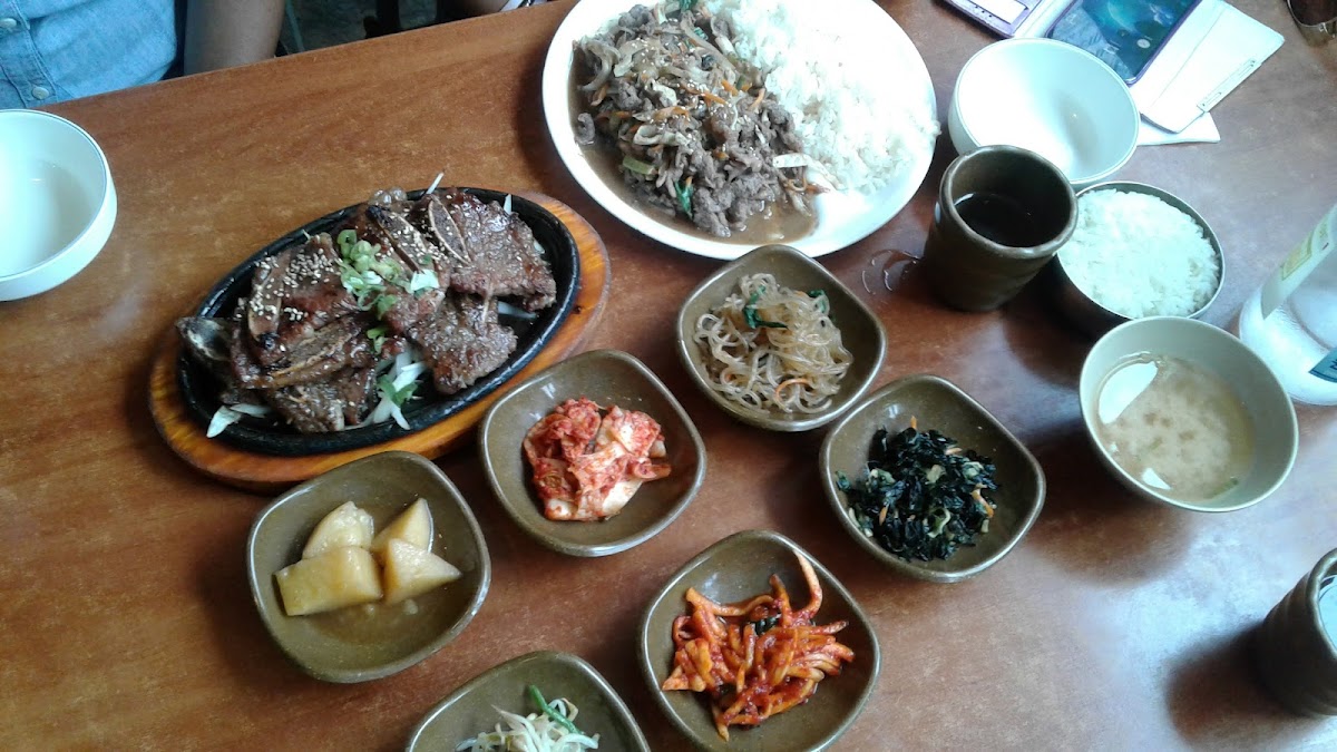 Meat and Seafood Dishes Served with Steamed Rice